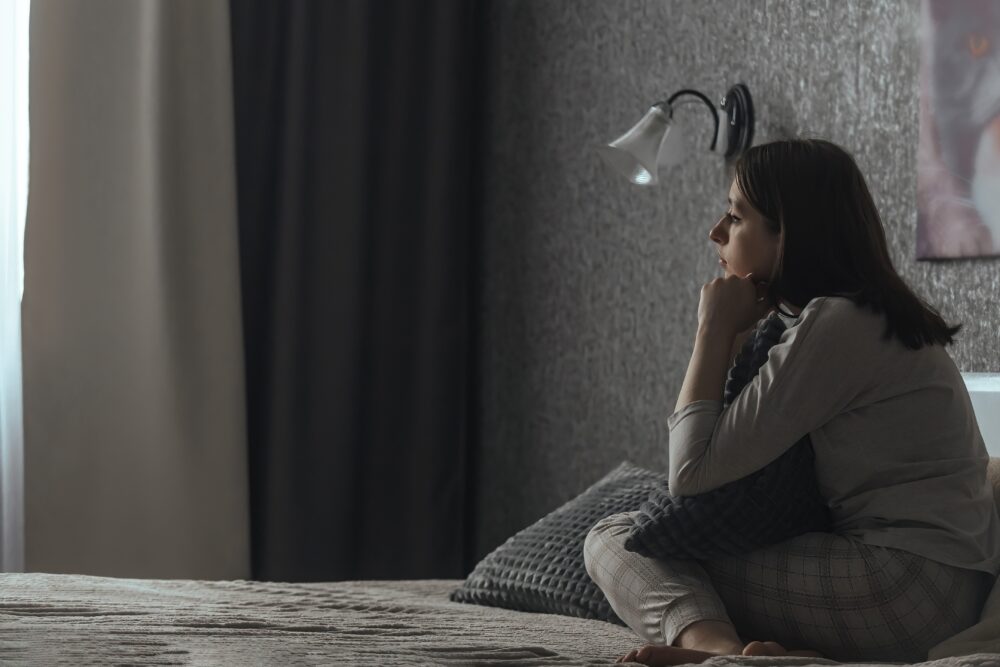 A,Sad,Young,Woman,In,Pajamas,With,Seasonal,Affective,Disorder seasonal affective disorder